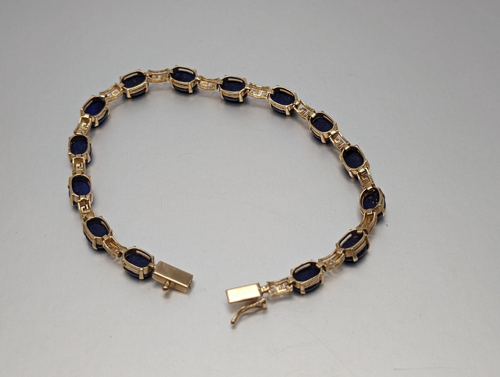 14kt Yellow Gold & Lapis Lazuli Oval Cabochon Greek Key Tennis Bracelet. 14kt Lapis Yellow Gold Bracelet.