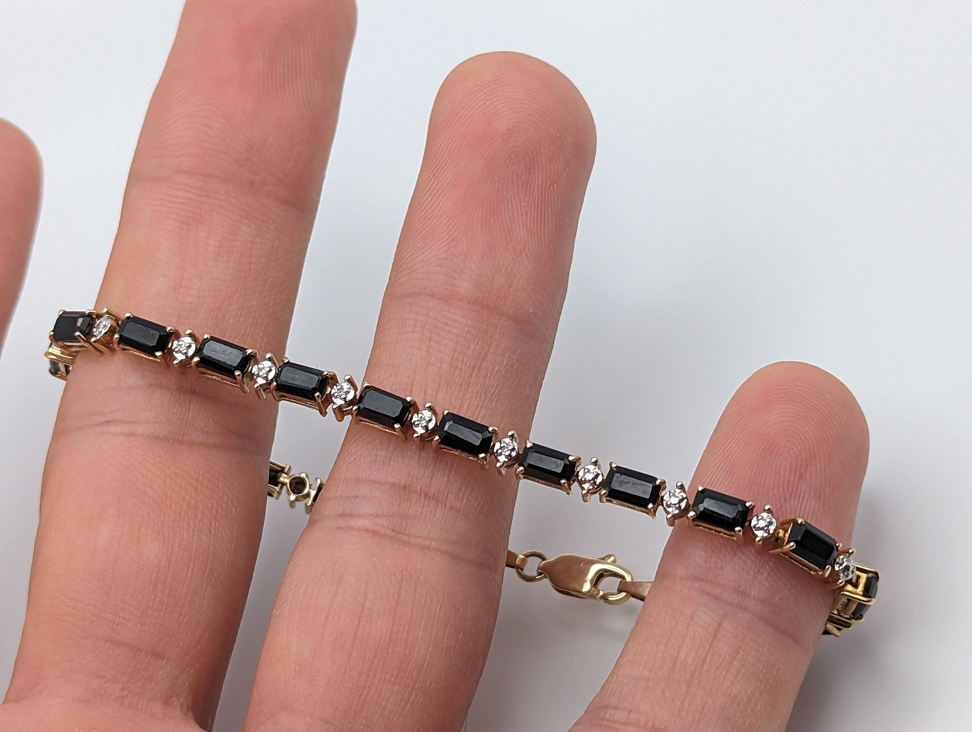 10k Onyx Diamond Yellow Gold Tennis Bracelet. 10k Onyx Diamond Bracelet. 8" Womens Onyx Gold Tennis Bracelet.