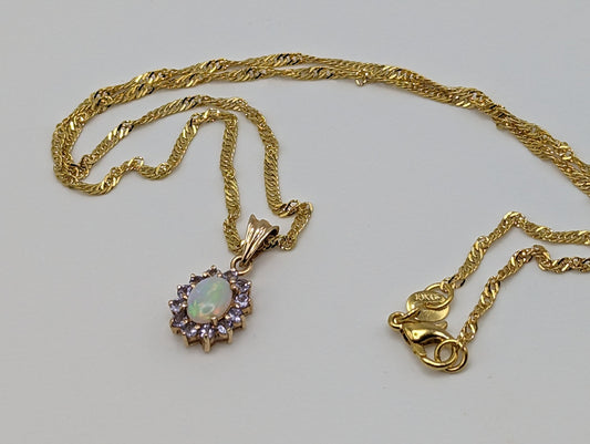 10k Yellow Gold Opal and Tanzanite Pendant. 10k Oval Opal Pendant. Complimentary 18k GF necklace