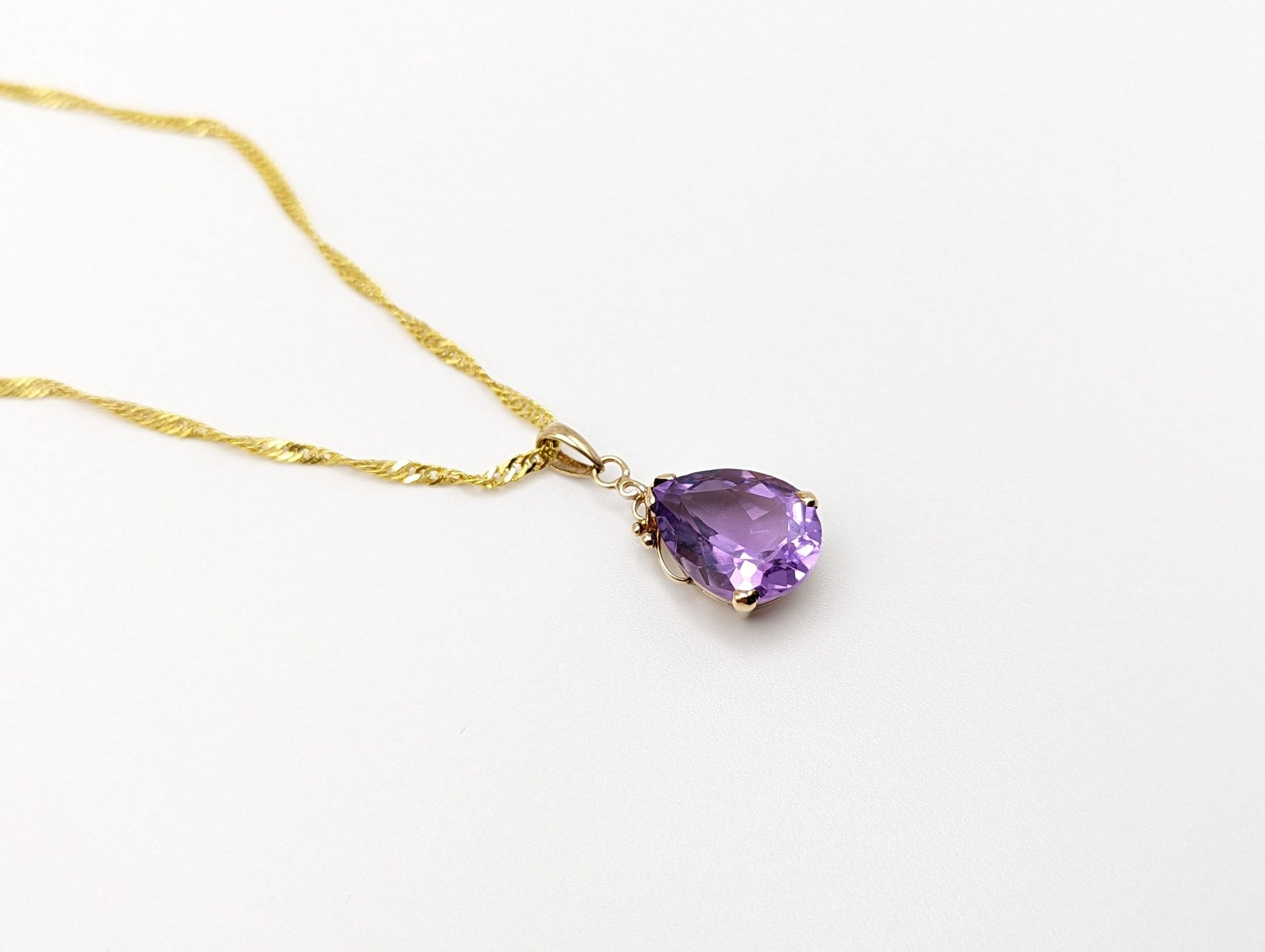 10k Yellow Gold Amethyst Pendant. Amethyst Pendant in 10k Yellow Gold Tear Drop Pendant. + 18k GF Necklace