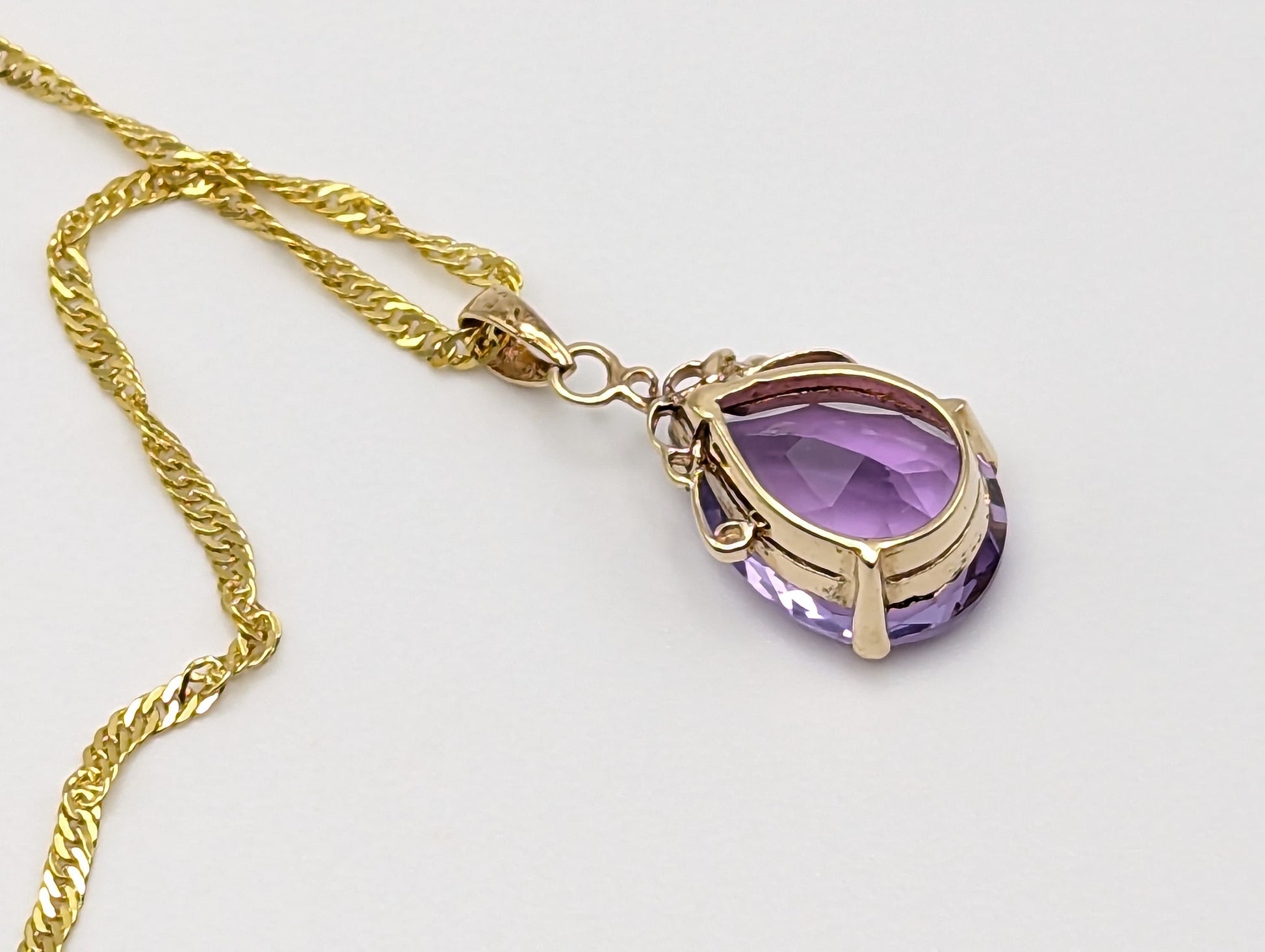 10k Yellow Gold Amethyst Pendant. Amethyst Pendant in 10k Yellow Gold Tear Drop Pendant. + 18k GF Necklace