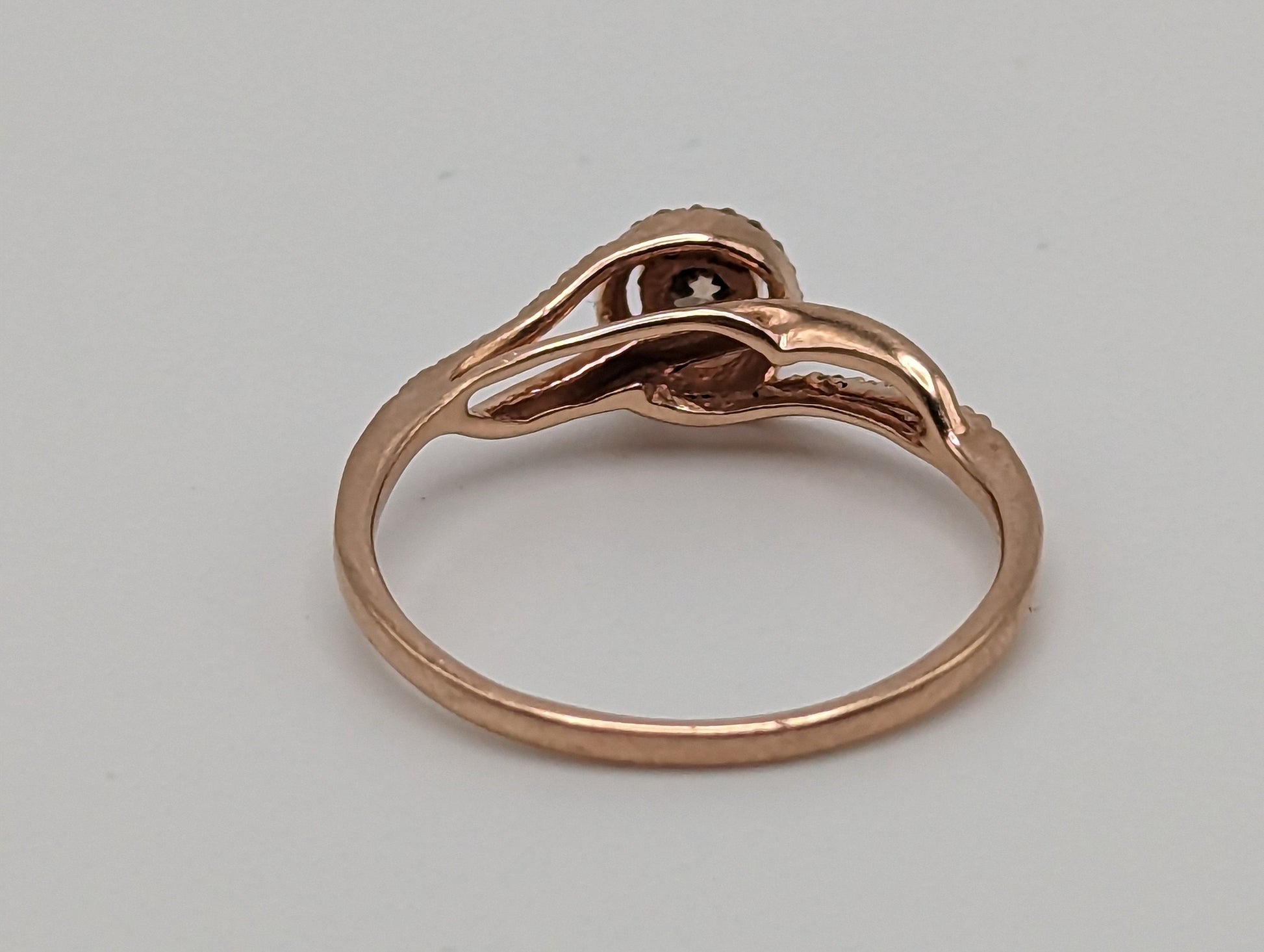 10k Rose Gold .21ctw Diamond Halo Infinity Ring. 10k Rose Gold Diamond Engagement Ring. 10 Rose Gold Diamond Promise Ring.