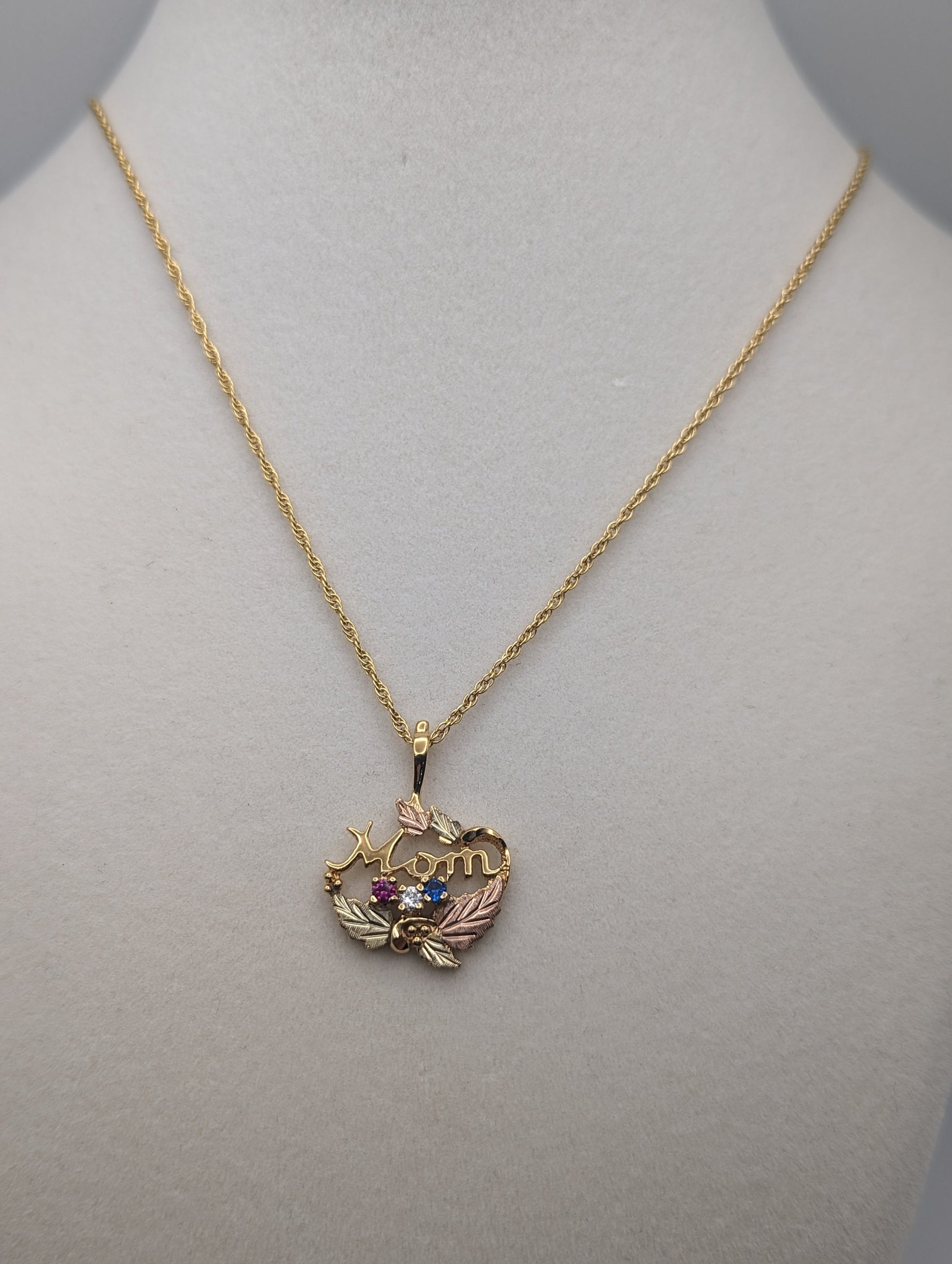 14k Black Hills Gold MOM Necklace. Black Hills Gold Mom w/ Ruby and Topaz Necklace. 18" GF Chain,