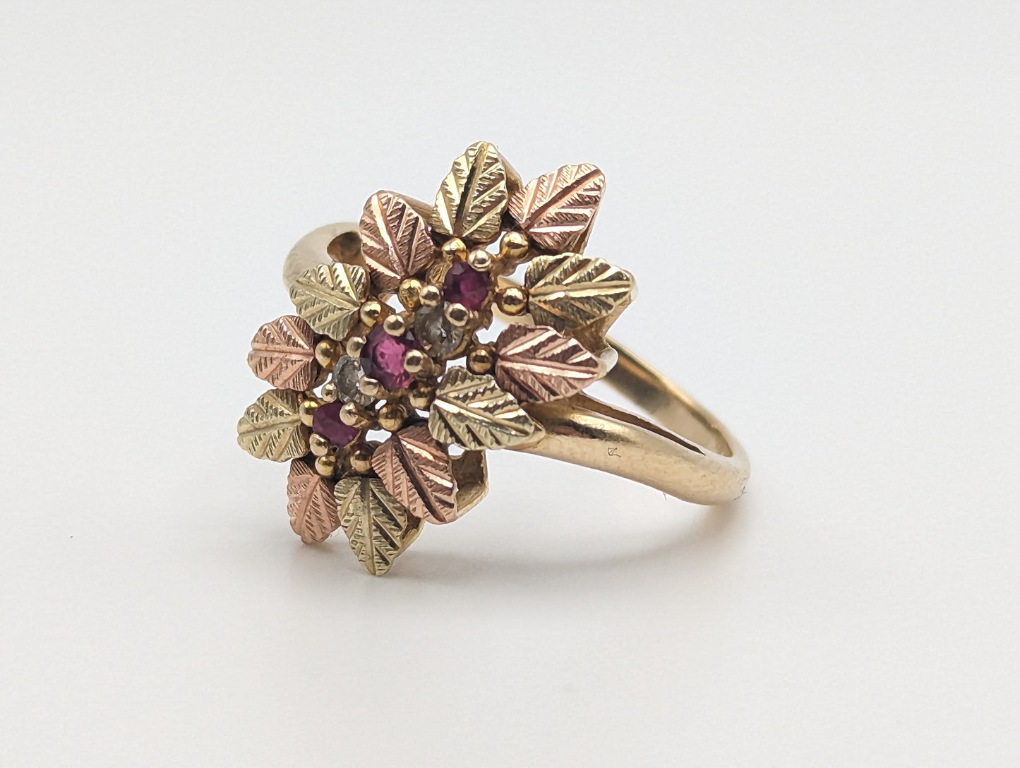 10k Heavy Black Hills Gold Tri-Colored Leaf Ruby Diamond Leaf Ring. Womens Black Hills Trio Gold Diamond and Ruby Leaf Ring.